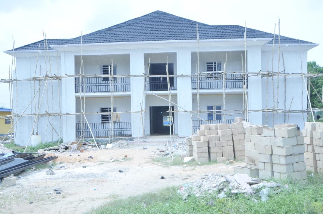 Two-storey officers' block. Two-storey block with balconies, scaffolding still up for finishes.
