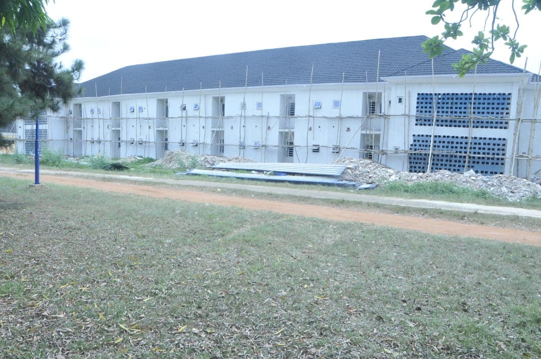 Block seen across the grounds. Landscaped grounds ahead of handover.